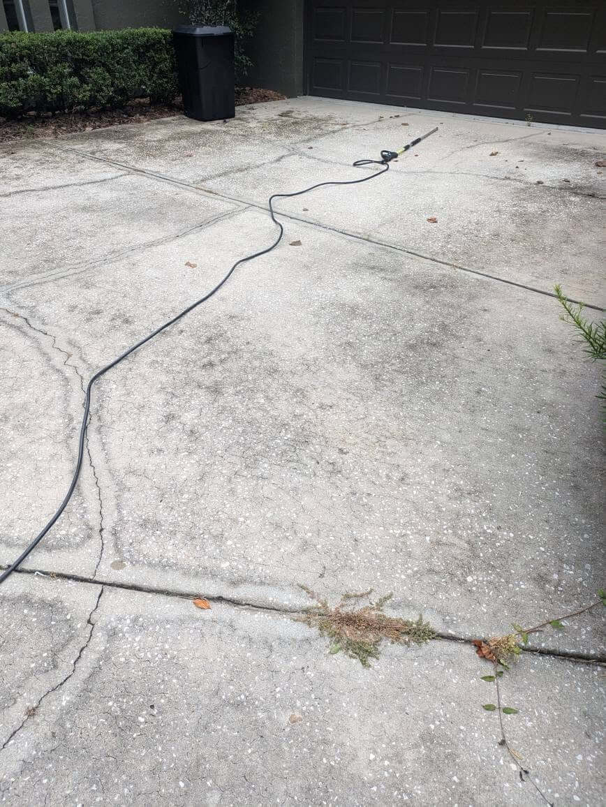 Driveway before power washing