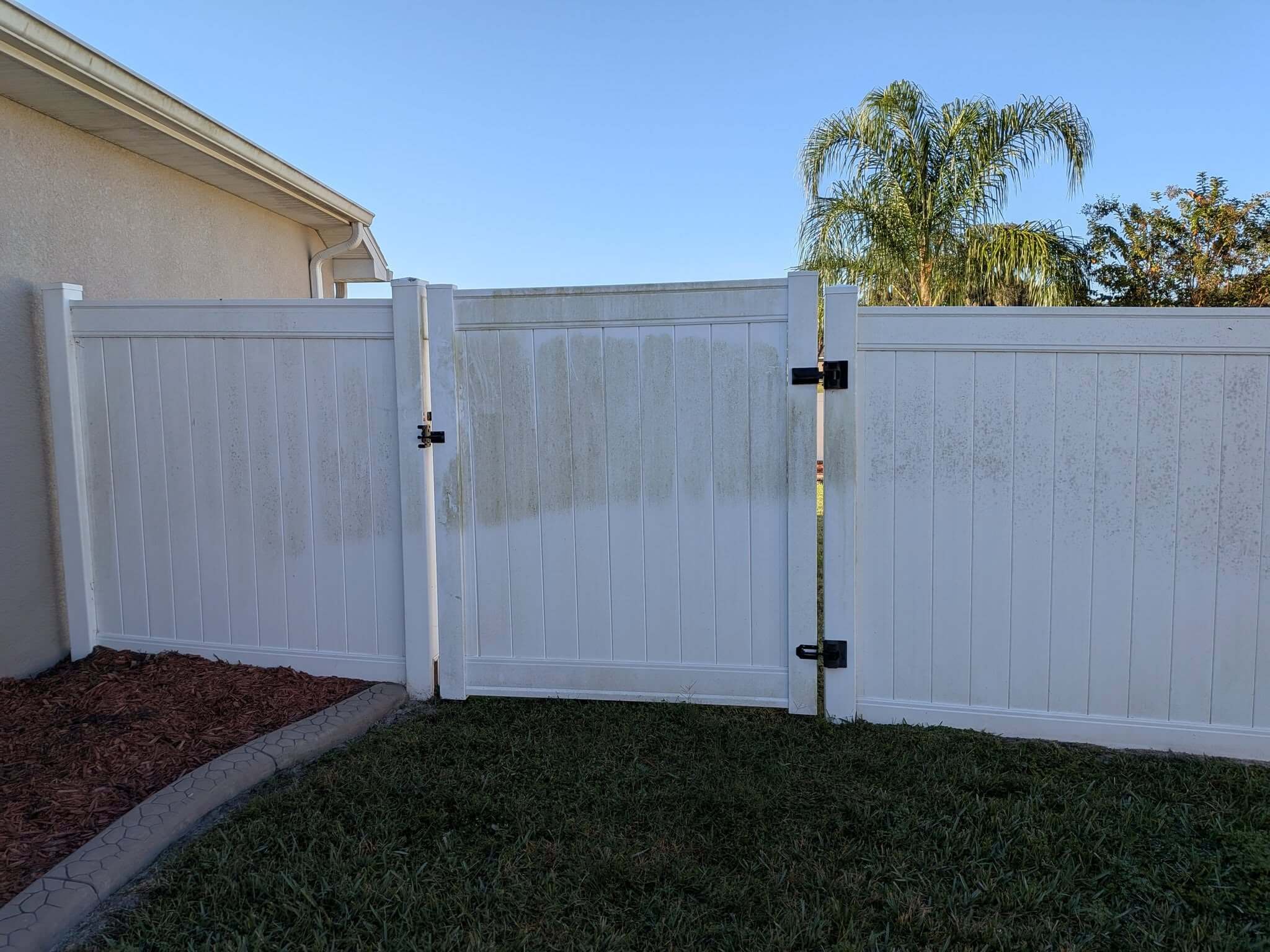 Fence before power washing